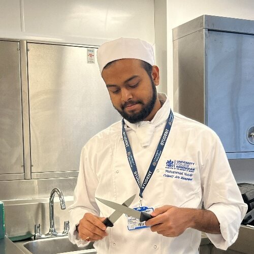 Chef Mohammad Husain in a professional kitchen